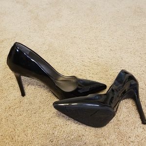Black glossy high heels